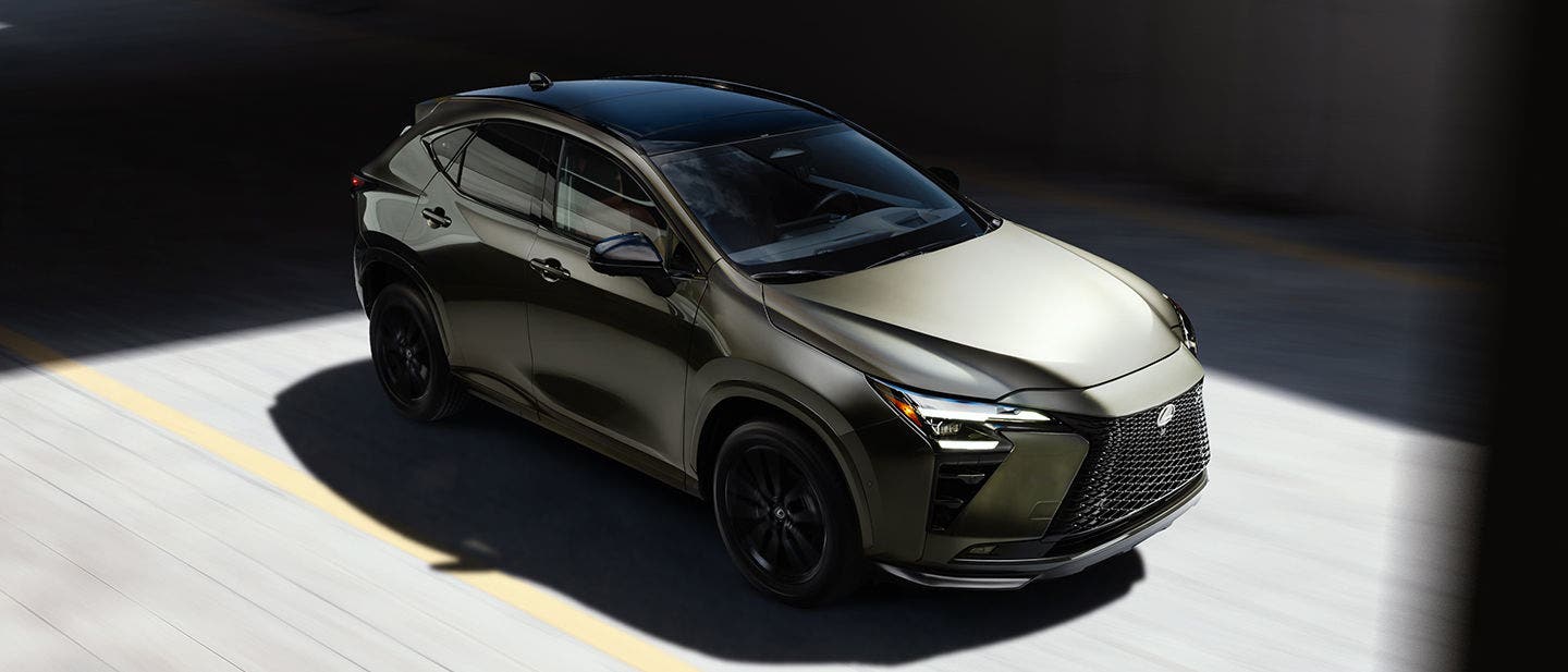 Lexus NX in dark green on an open road, seen from above