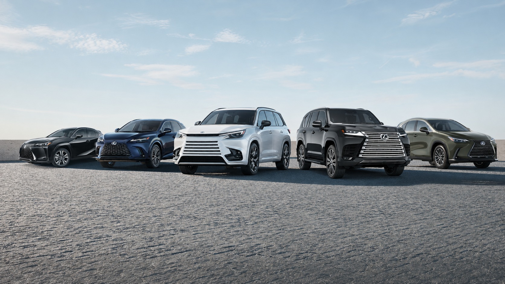Five Lexus models lined up side by side, sedans through to full-size SUVs