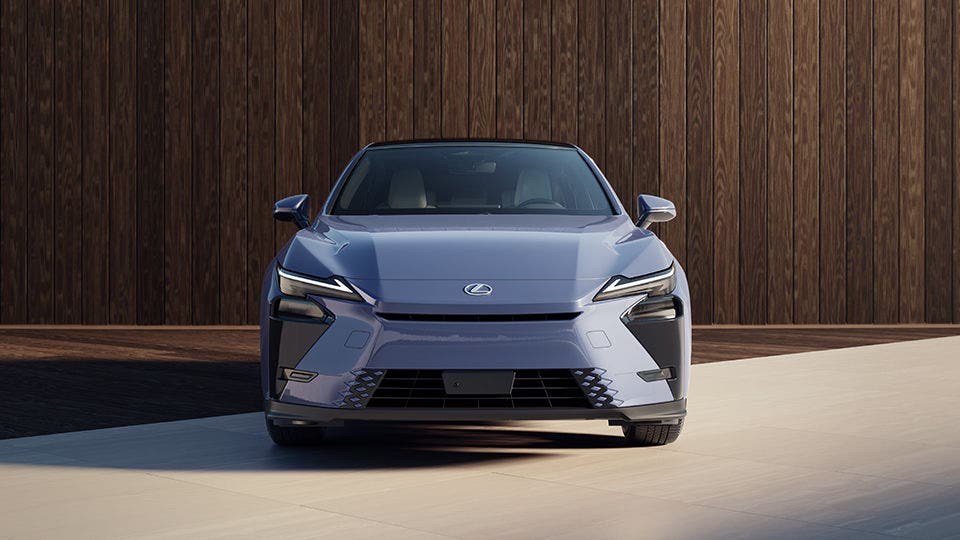 Lexus RZ electric crossover in silver-blue, head-on studio view