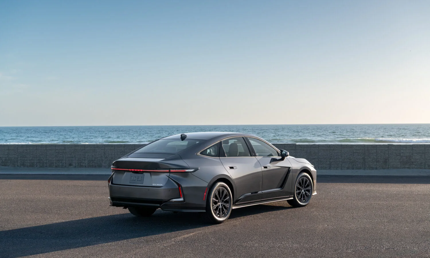 Lexus ES 350h in Cloudburst Gray, rear three-quarter view