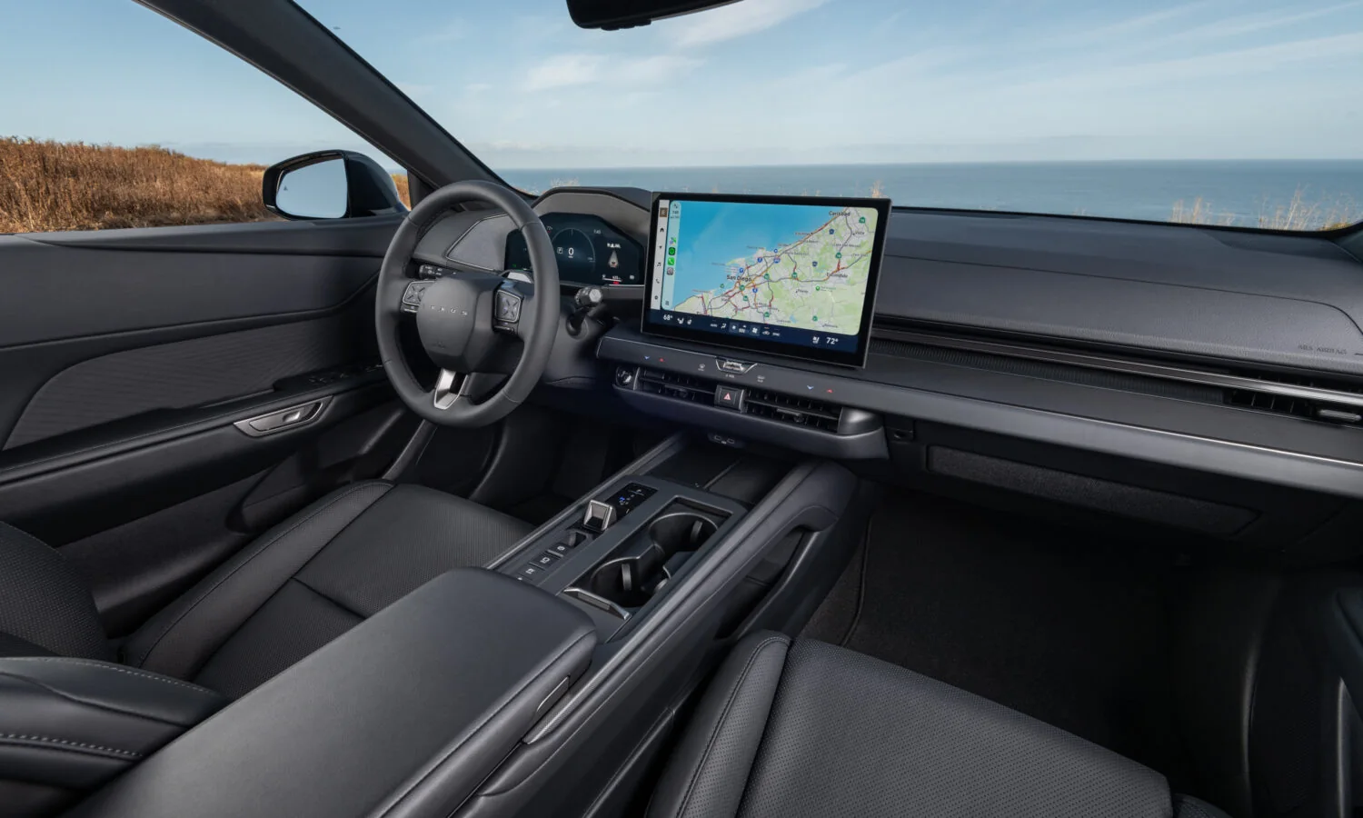 Lexus ES 350h interior showing the dashboard, steering wheel and center touchscreen