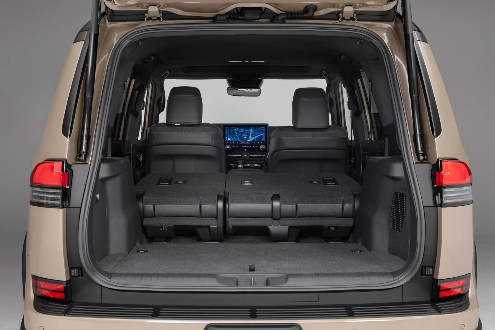 Lexus GX Overtrail with the tailgate open, showing the cargo area and folded seats