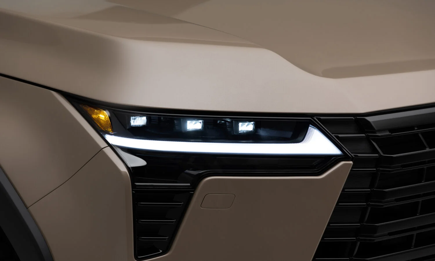 Close-up of the Lexus GX Overtrail headlight and daytime running lamp