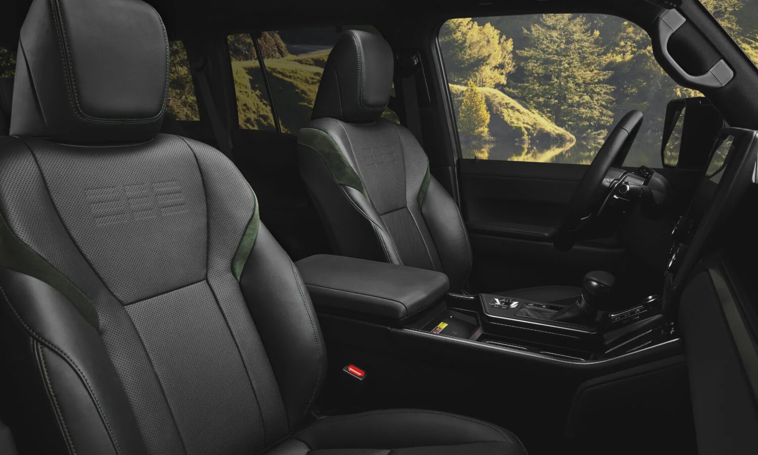 Lexus GX Overtrail interior showing the front and second-row seats