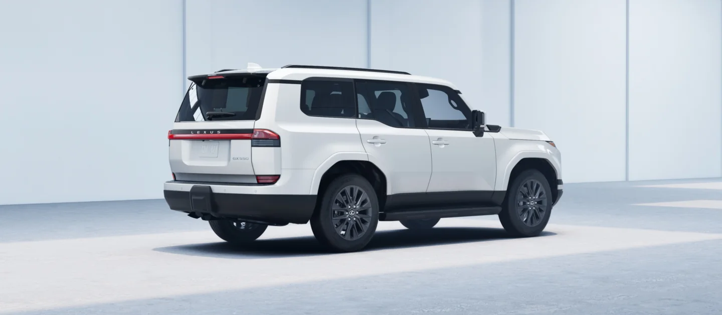 Lexus GX in white, rear three-quarter view