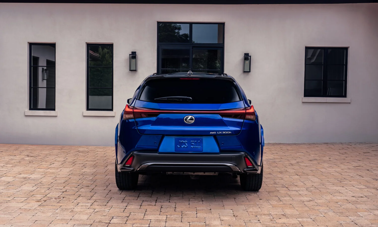 Lexus UX 300h F SPORT in blue from directly behind